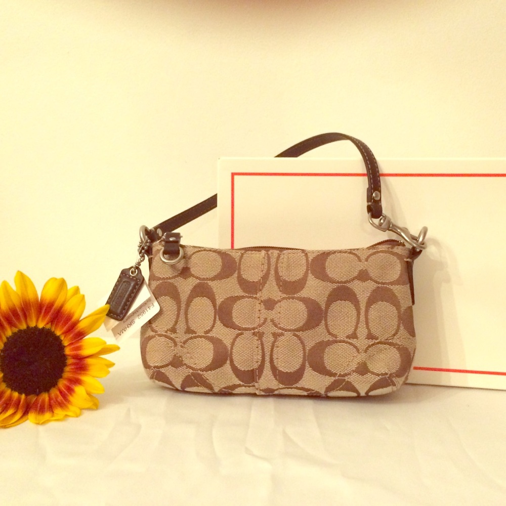 *Brand New Coach wristlet with tags